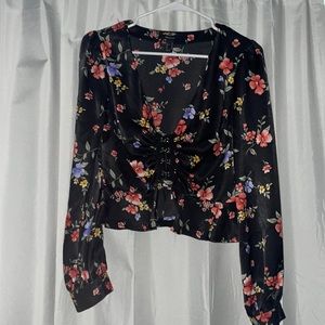 Beautiful floral blouse with clasps down the front